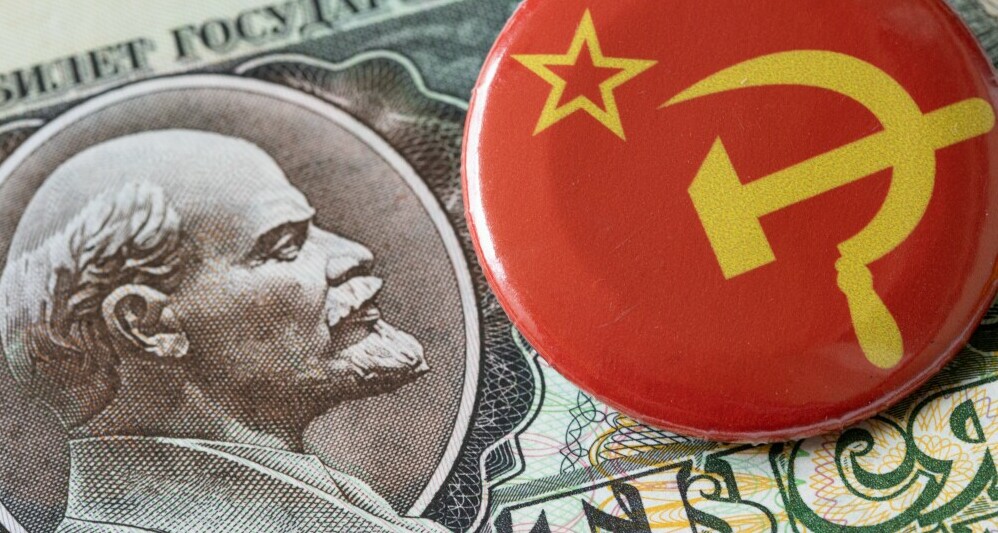 Lenin and a hammer and sickle badge