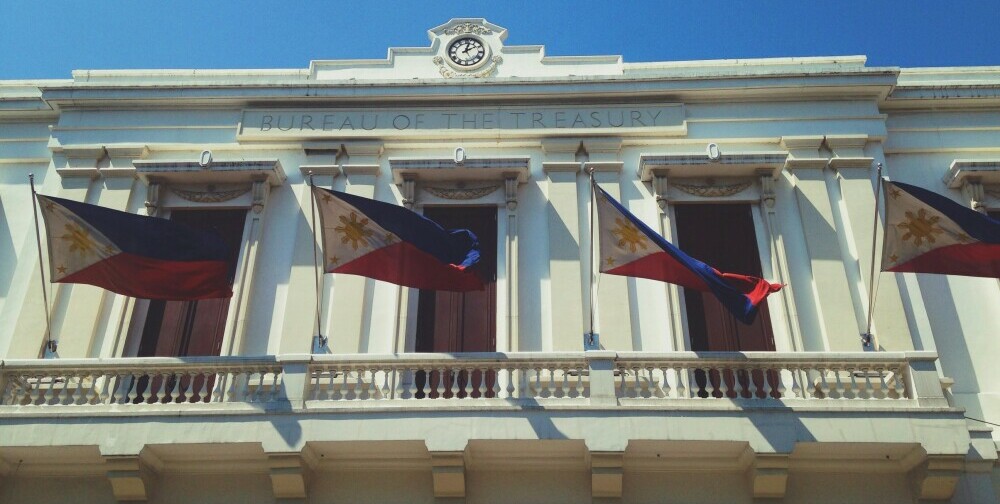 The Filipino flag on a government building The Filipino flag on a government building