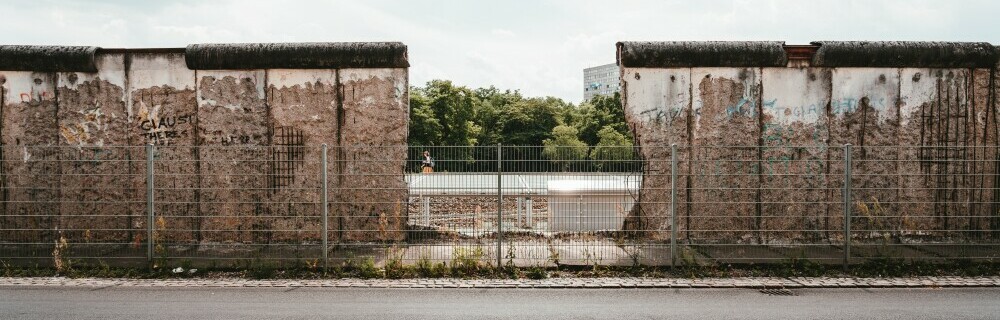 The Berlin Wall with a hole punched through it