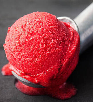 To Churn Or Not To Churn Which Ice Cream Making Method Suits You Best Image 7 scoop of bright red sorbet frosted fusions