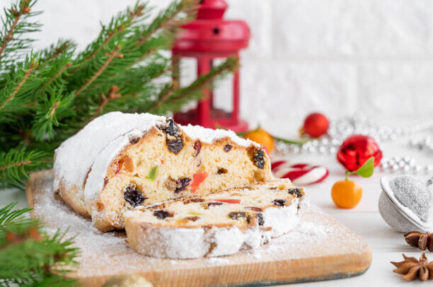 Stollen Cake Ice Cream Recipe - A Taste Of Germany image 5 stollen cake sliced to show fruits inside frosted fusions