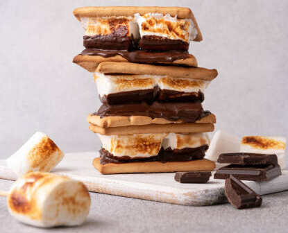 S'mores Homemade Ice Cream Recipe Ideas image 7 stack of smores with toasted marshmallows and chunks of chocolate frosted fusions