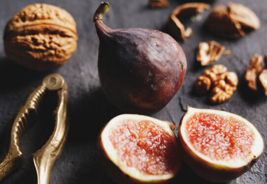 Homemade Fig And Honey Ice Cream Recipe image 5 fresh figs with walnuts and a nut cracker frosted fusions