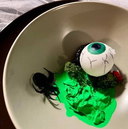 Halloween Ice Cream Treats - Spooky Ice Scream Recipes For The Occasion image 4 bowl of green bubblegum ice cream with eyeball and spiders frosted fusions