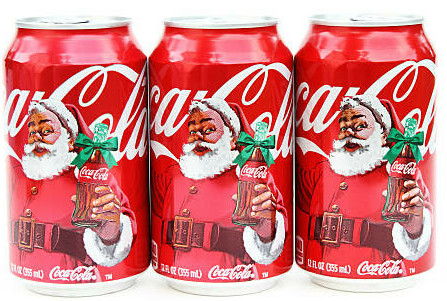 Festive Homemade Ice Cream Flavours for a Cosy and Delicious Christmas image 10 three coca cola cans lined up with santa on front frosted fusions