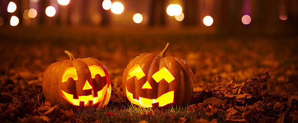 Halloween Ice Cream Treats - Spooky Ice Scream Recipes For The Occasion image 1 two carved pumpkins with lights in the background frosted fusions