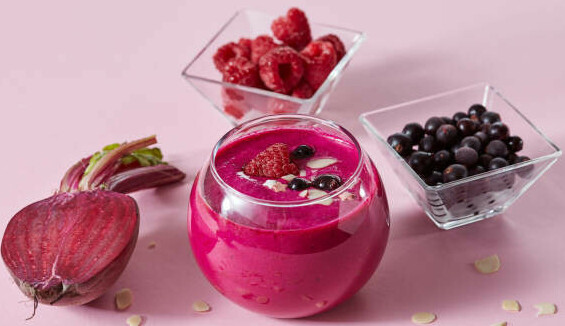 The Power Of Fat-Burning Smoothies image 8 beetroot and berries and vibrant pink smoothie in glass frosted fusions