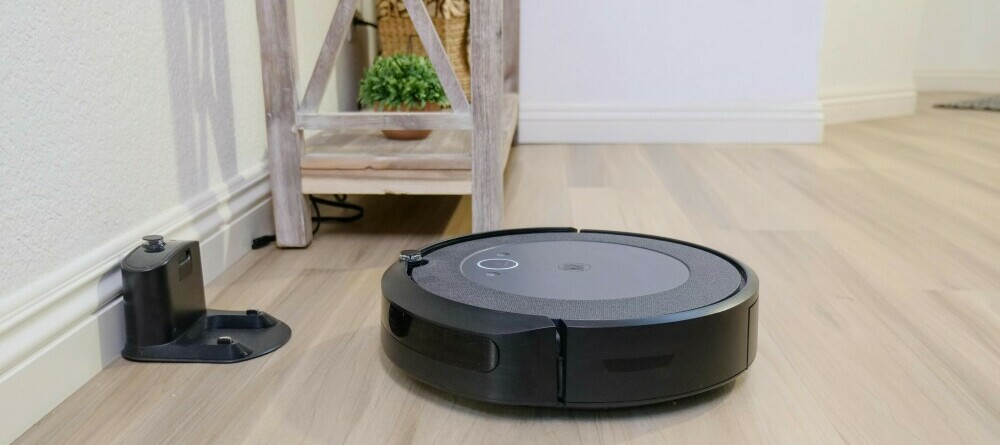 Roomba Robot Vacuum approaching docking station.