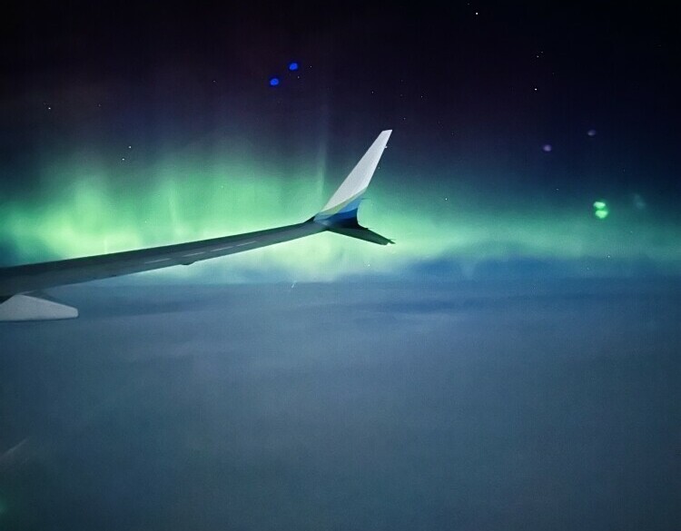 Northern lights, flying, travel