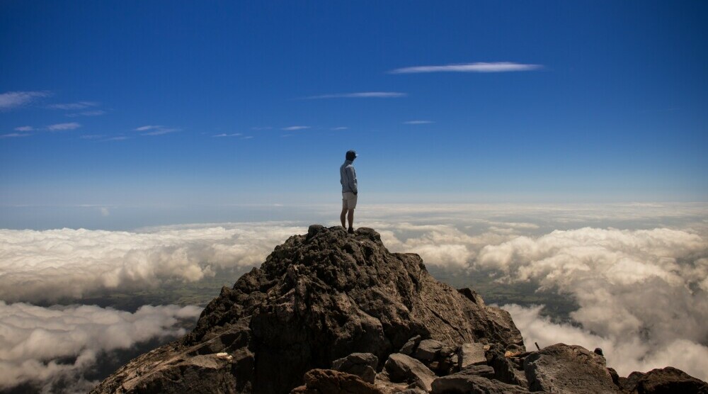 standing on a summit