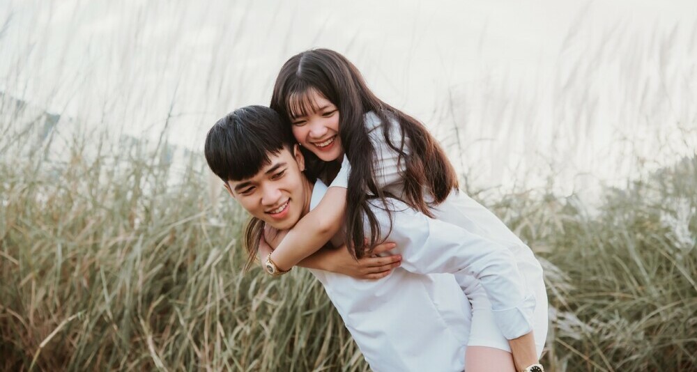 Guy carrying girl on his back