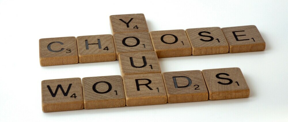 Choose your words written with scabble blocks