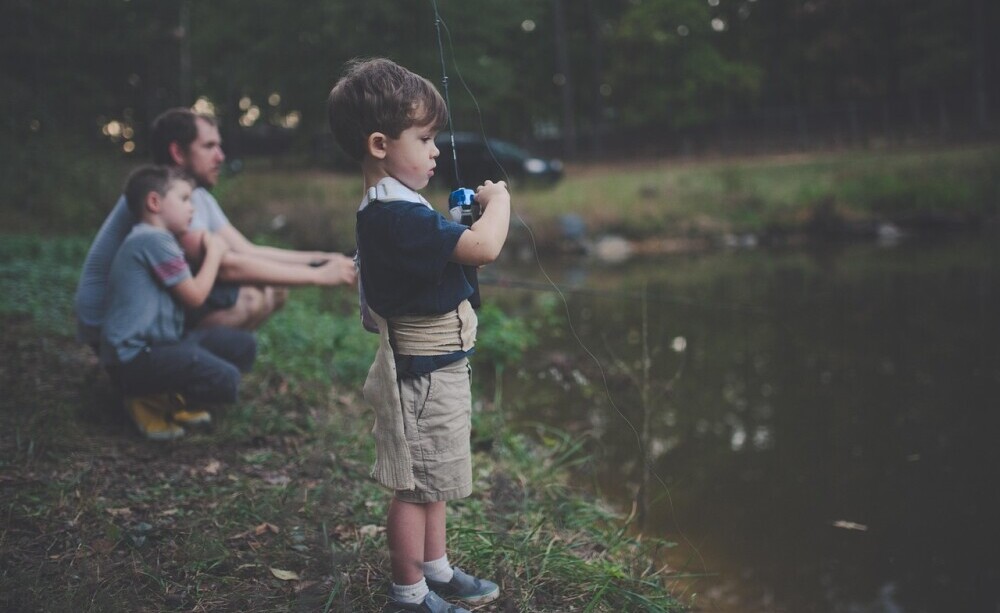 Kids out fishing in Lake Webster