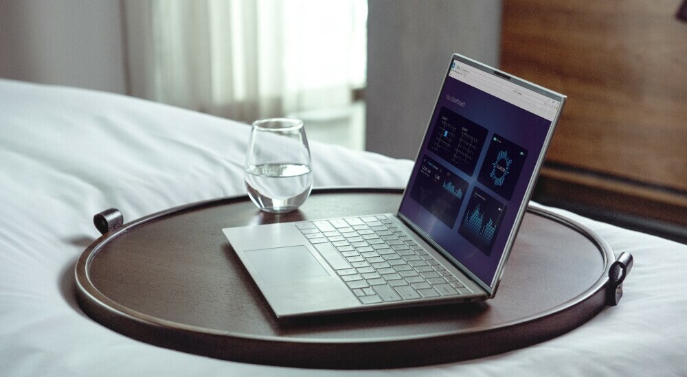 laptop with glass of water