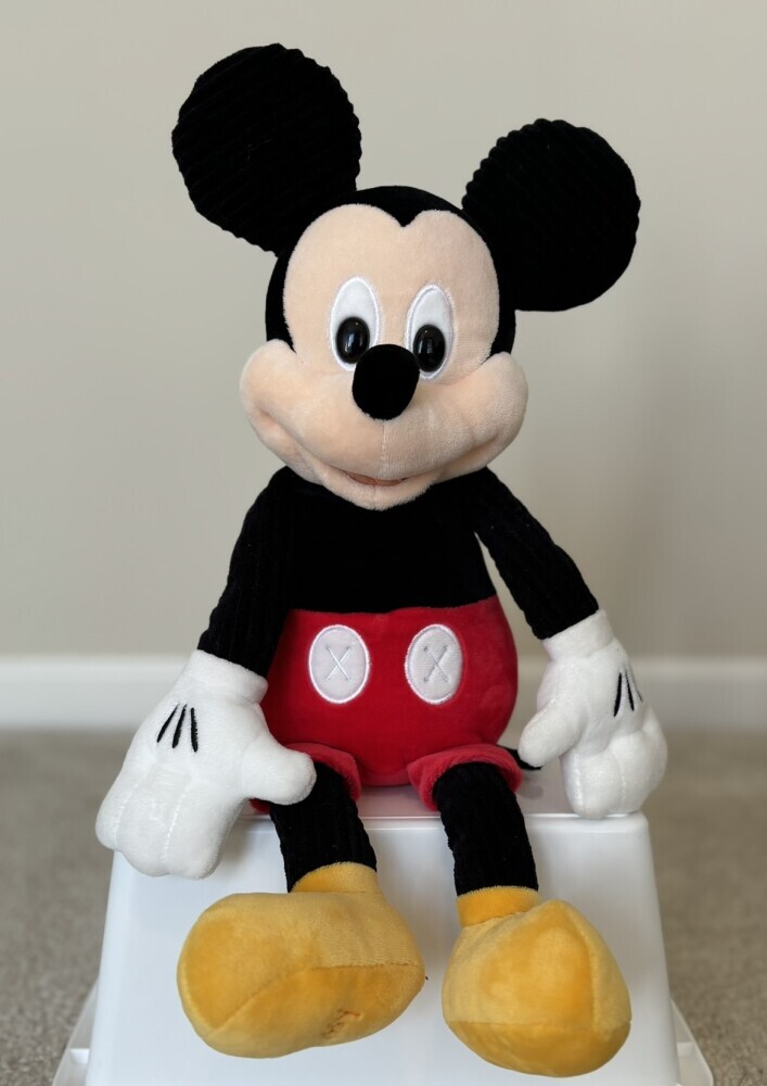 Picture of stuffed Mickey Mouse doll to relate to topic of Disney Jigsaw Puzzle.