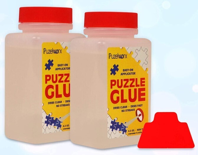 Picture of two Puzelworx glue bottles and spreader