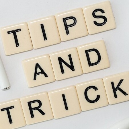 Tips and Tricks tiles with ear buds and case