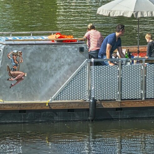 unique pontoon on the water with people
