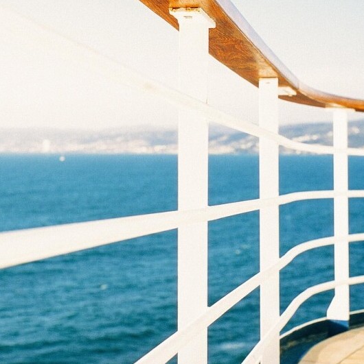 boat deck railing on the water