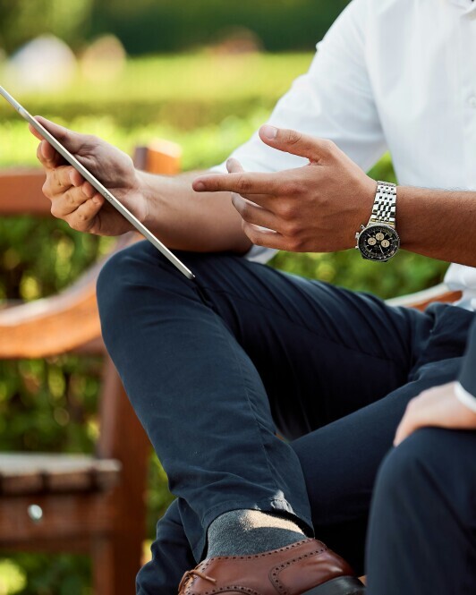 Image of man holding tablet