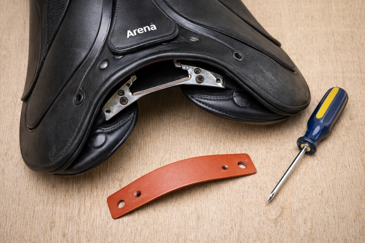 Close up of Arena monoflap dressage saddle showing interchangeable gullet system with steel gullet plate removed