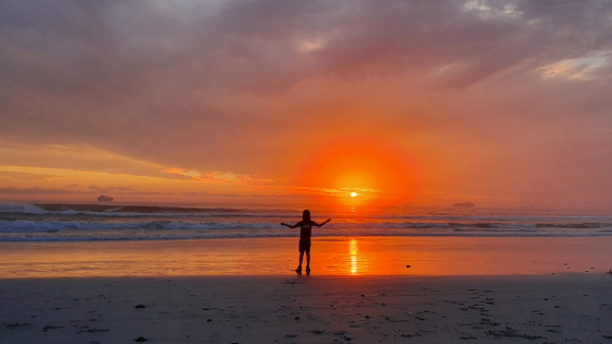 Praying child_sunset beach_capeTown_sunset
