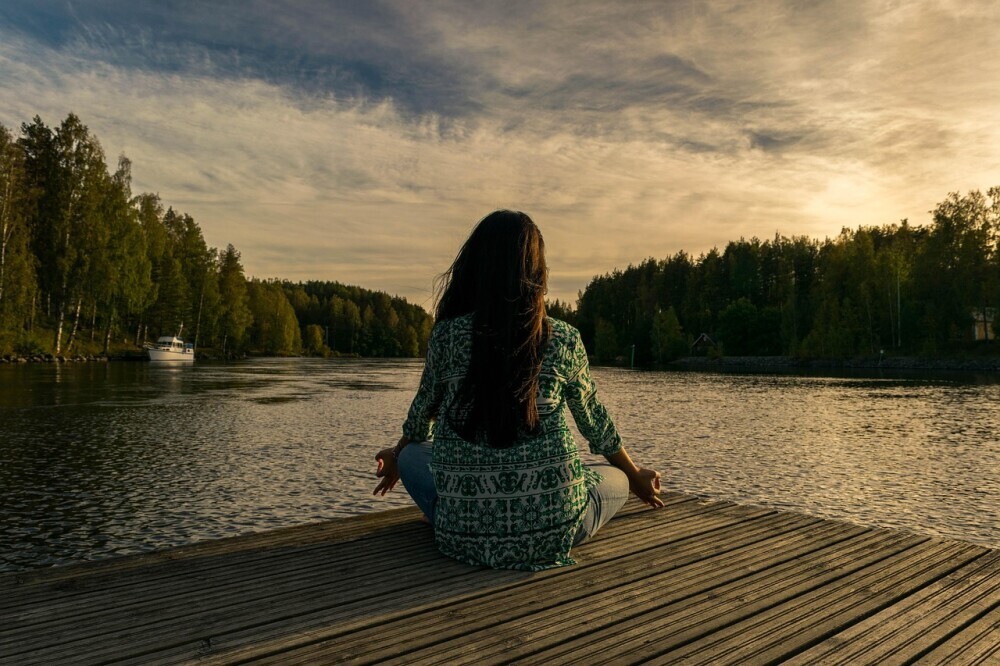 a woman in mindfulness meditation