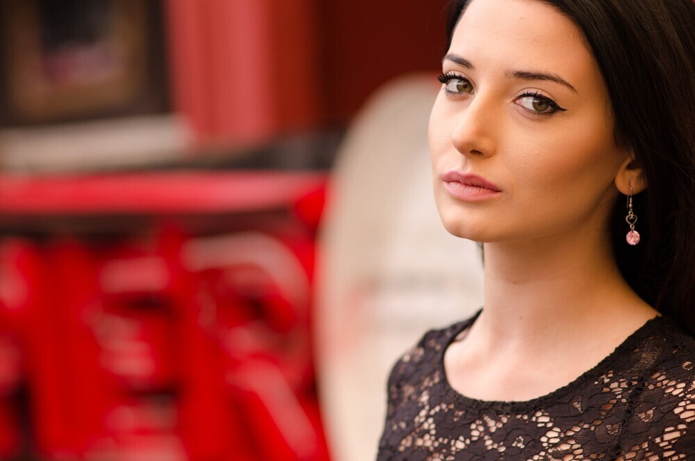 a woman with a pretty acne free face