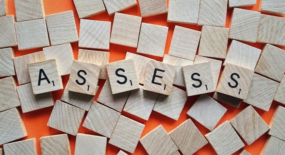 scrabble tiles spelling assess