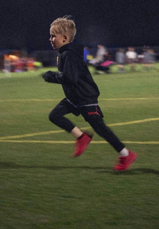 young player running