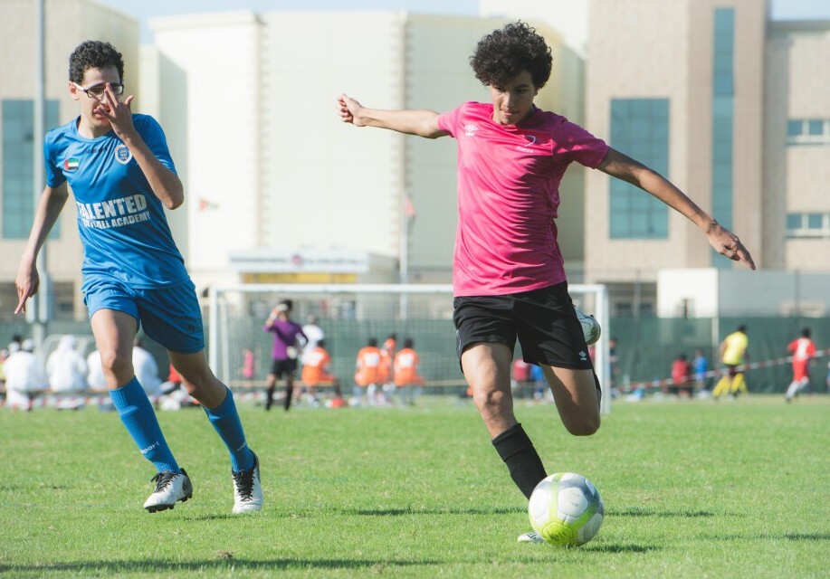 young player shooting