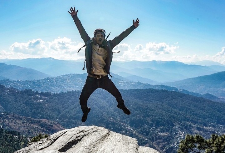 Man Jumping on the Hill