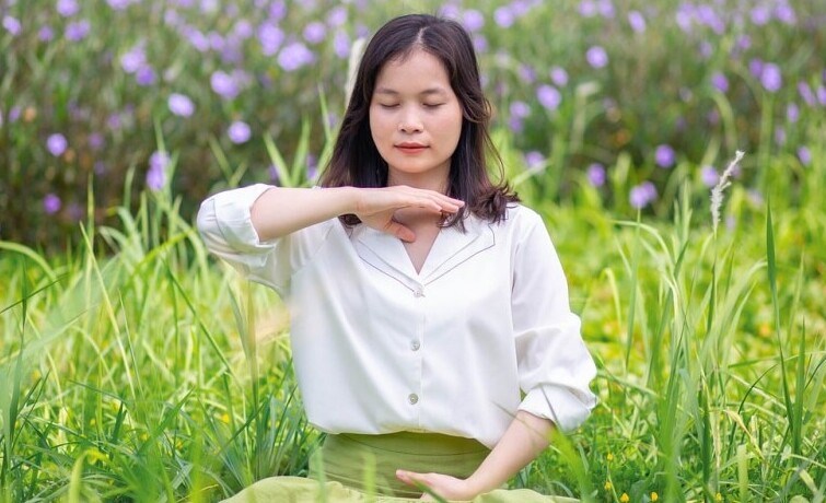 Woman Meditating Outside