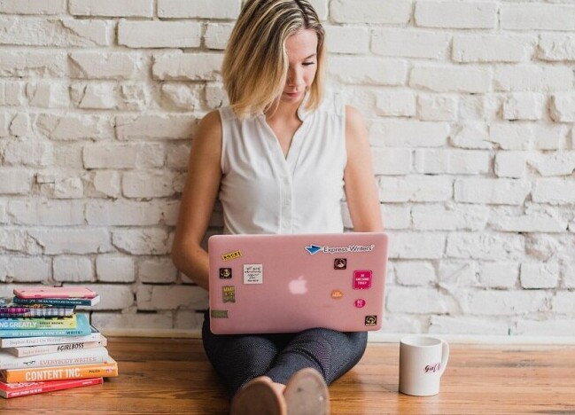 Girl Writing On the Computer