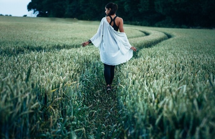 Girl Walking on the Field