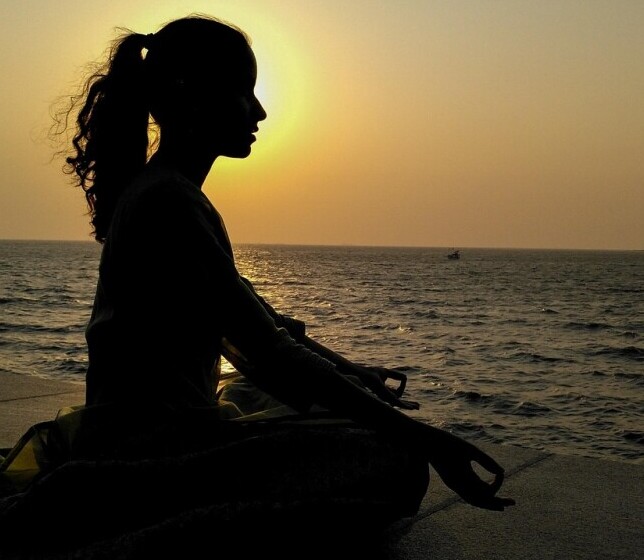 Girl Into Meditation Outside