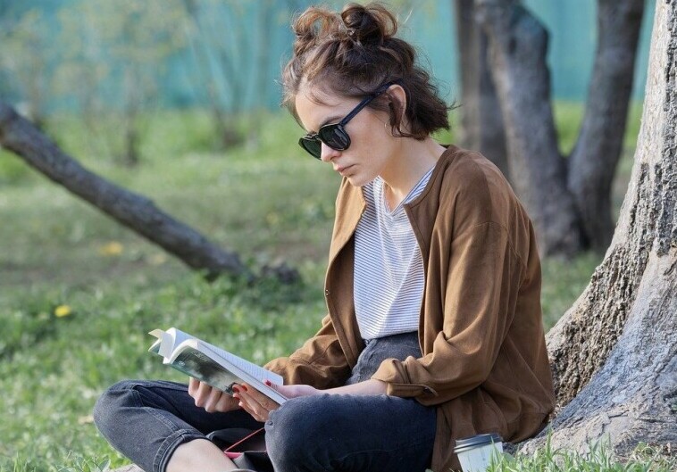 Girl Reading Outside